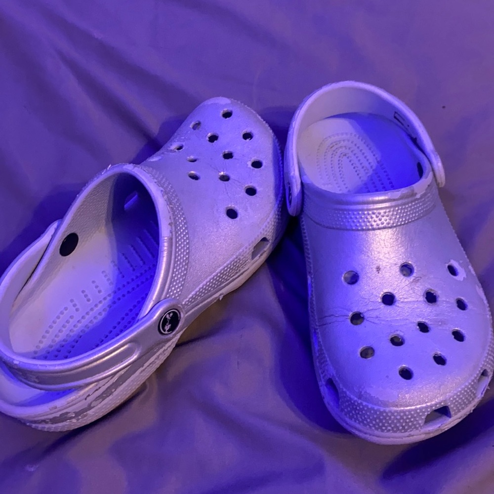 Metallic light blue crocs. Size 7